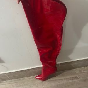 Red thigh high boot heel
